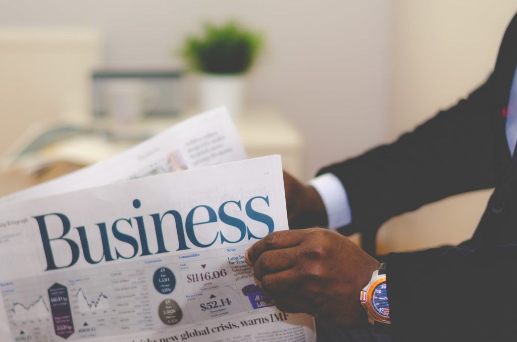 A businessman reading the newspaper