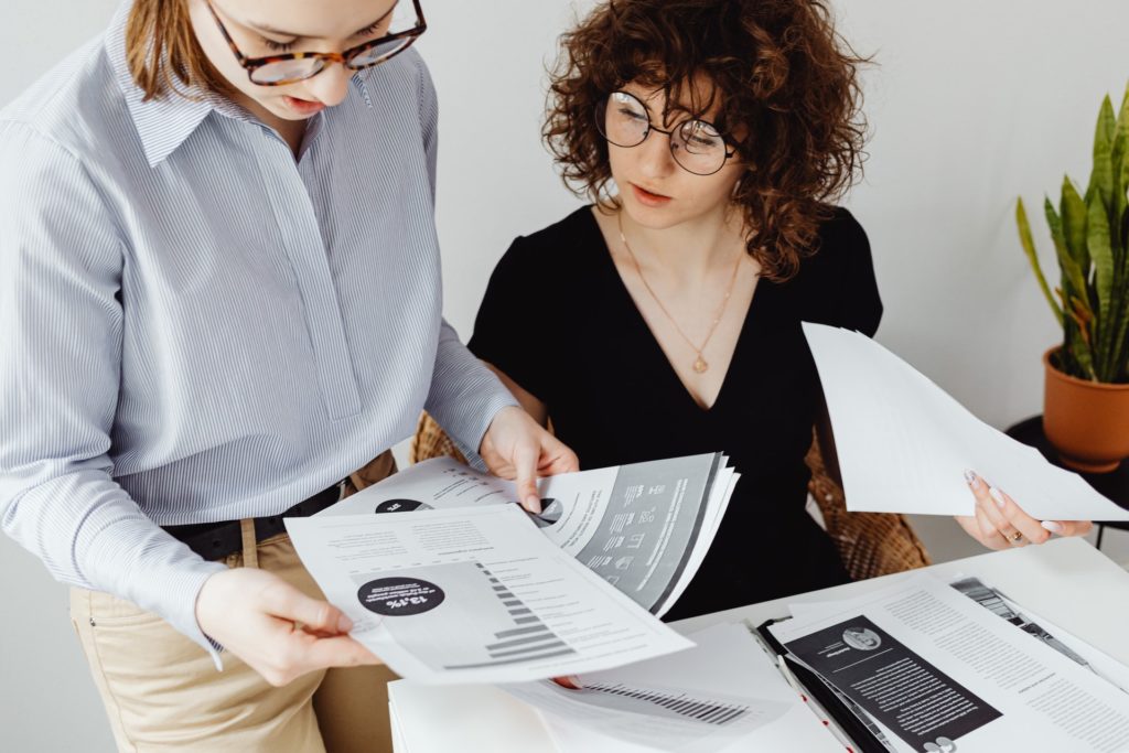 Two woman streamlining their accounting processes