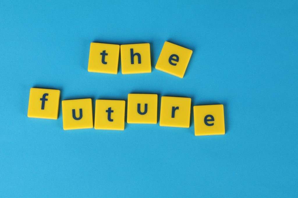 Yellow tiles spelling "the future" against a blue background