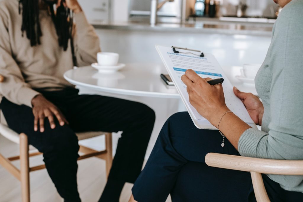 Man being interviewed by a prospective employer