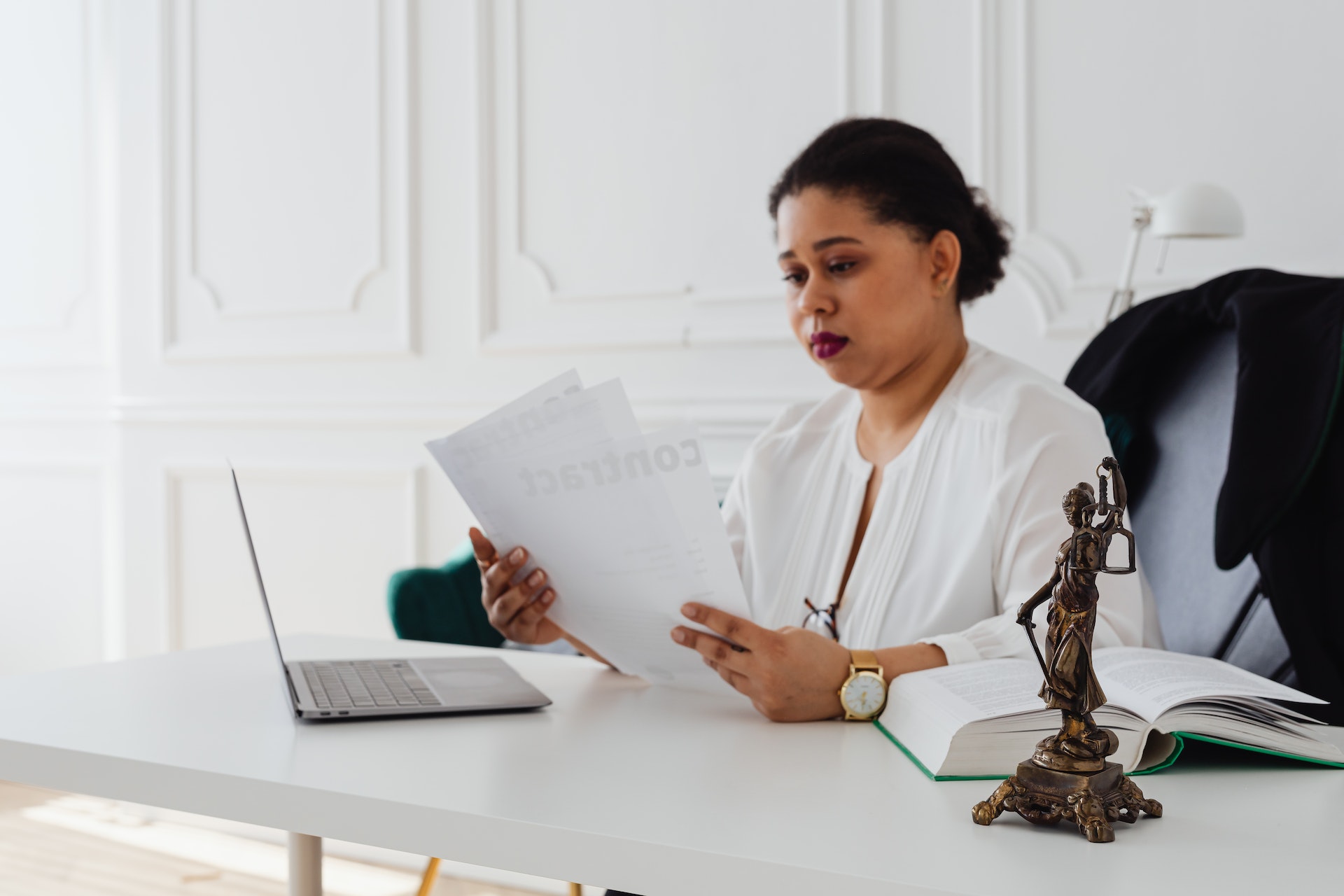 A female employer approving payments