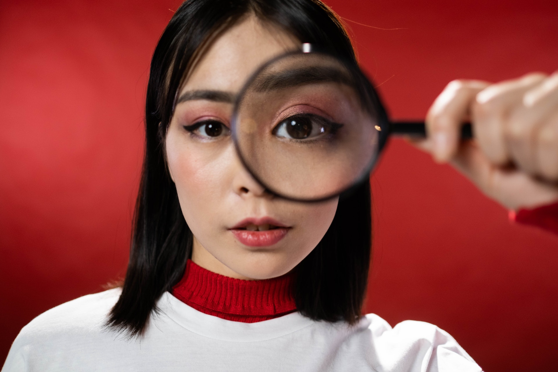 woman with magnifying glass