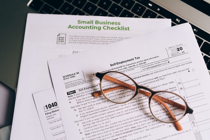 eyeglass over accounting checklist