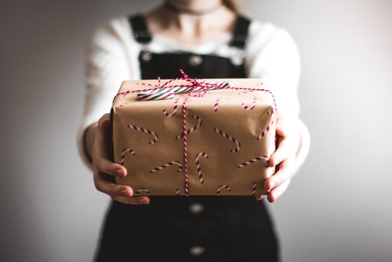 woman giving gift