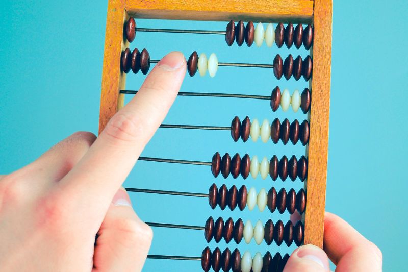 accountant calculating with abacus